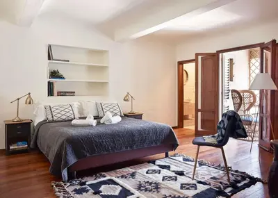 Letto o letti in una camera di Great Location Just Infront of Pitti Palace