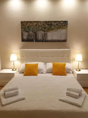Letto o letti in una camera di Pink Wolf