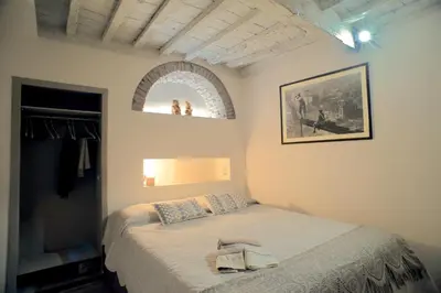 Letto o letti in una camera di Giselle Suite - Brand new flat in Santa Maria Novella