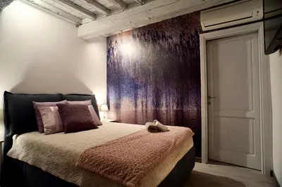 Letto o letti in una camera di Giulietta Suite - Brand New flat in Santa Maria Novella