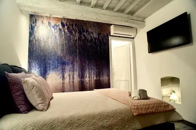 Letto o letti in una camera di Giulietta Suite - Brand New flat in Santa Maria Novella