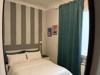 Letto o letti in una camera di San Frediano Boutique