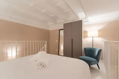 Letto o letti in una camera di Scala Apartments Via Borgo Pinti