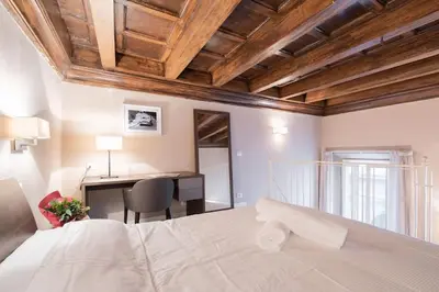 Letto o letti in una camera di Scala Apartments Via Borgo Pinti