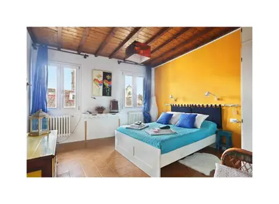 Letto o letti in una camera di Appartamento di Marzia in Oltrarno