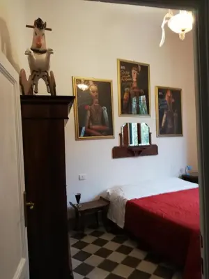 Letto o letti in una camera di la ginella la casa vintage