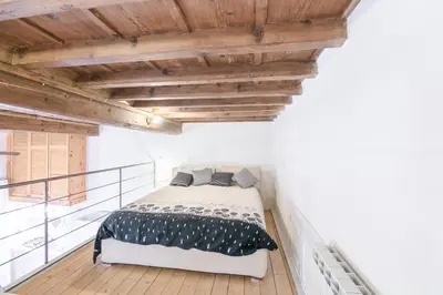 Letto o letti in una camera di San Niccolò Loft by Mmega