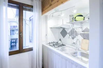 Cucina o angolo cottura di San Niccolò Loft by Mmega