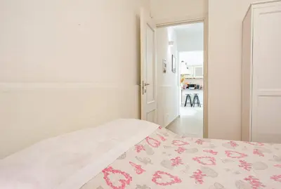 Letto o letti in una camera di Gourmet B&B Villa Landucci