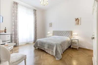 Letto o letti in una camera di Gourmet B&B Villa Landucci