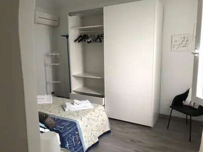 Letto o letti in una camera di Appartamento Firenze Centro Amorino con terrazzo