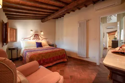 Letto o letti in una camera di Le Rose Siberine - Antica Dimora