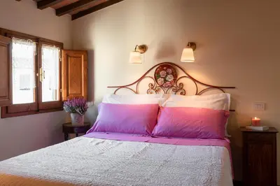 Letto o letti in una camera di Le Rose Siberine - Antica Dimora