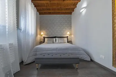 Letto o letti in una camera di Casa Gallo Firenze