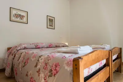 Letto o letti in una camera di B&B Querceto
