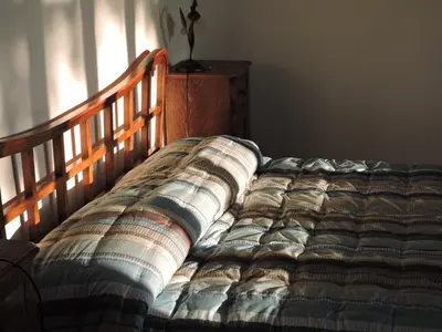 Letto o letti in una camera di B&B Querceto