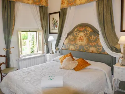 Letto o letti in una camera di La Rugea - Le Spighe Resort