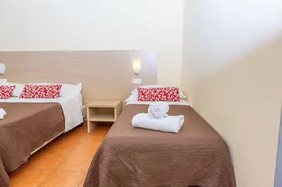 Letto o letti in una camera di Corte Passi Florence