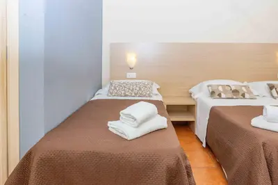Letto o letti in una camera di Corte Passi Florence