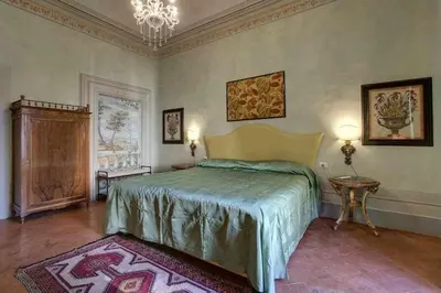 Letto o letti in una camera di Salvemini Elegant Close To Piazza Santa Croce