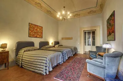 Letto o letti in una camera di Salvemini Elegant Close To Piazza Santa Croce