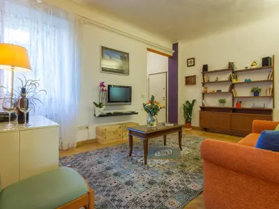 Area soggiorno di Paolo and Carlotta's Home - large and central apartment between two nice parks