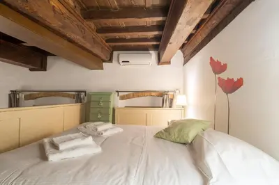 Letto o letti in una camera di Lambertesca Loft by Mmega