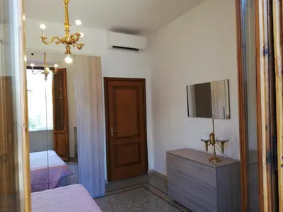 Letto o letti in una camera di Prato Barone a Firenze