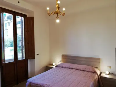 Letto o letti in una camera di Prato Barone a Firenze