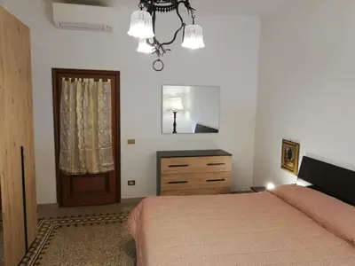 Letto o letti in una camera di Prato Barone a Firenze