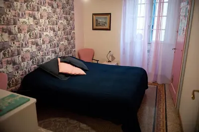 Letto o letti in una camera di 53 Via Faenza