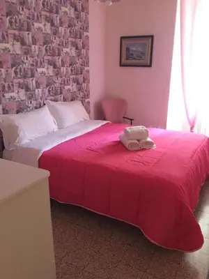 Letto o letti in una camera di 53 Via Faenza