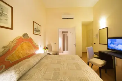 Letto o letti in una camera di Locanda Orchidea