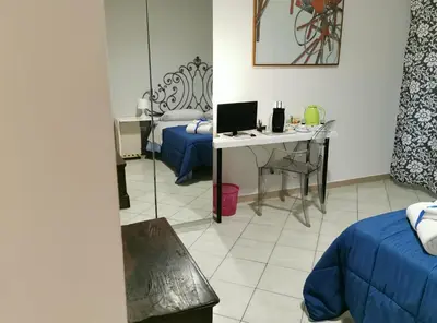 Letto o letti in una camera di B&B BARBERA