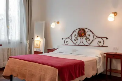 Letto o letti in una camera di Le Rose di Leonardo - Antica Dimora