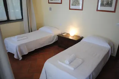 Letto o letti in una camera di Agriturismo Fattoria di Malavolta