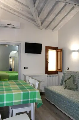 TV o dispositivi per l'intrattenimento presso Gmax Guelfa Apartments
