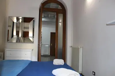 Letto o letti in una camera di Gmax Guelfa Apartments
