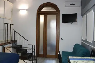 TV o dispositivi per l'intrattenimento presso Gmax Guelfa Apartments