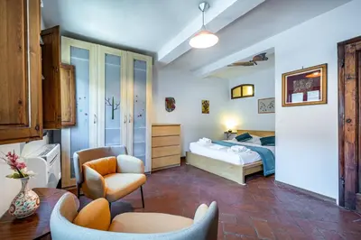 Letto o letti in una camera di Roommo Viola