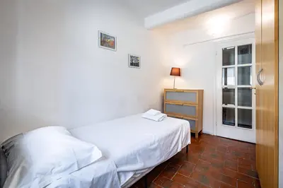 Letto o letti in una camera di Roommo Viola