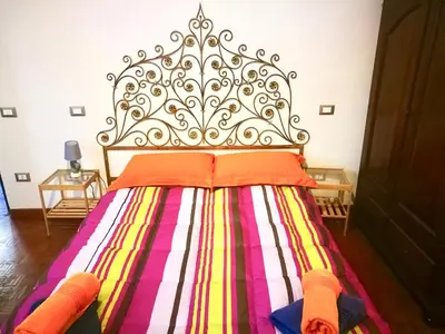 Letto o letti in una camera di 1 pitti apartment