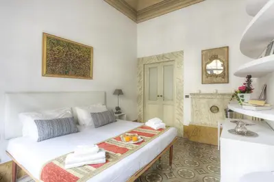 Letto o letti in una camera di Duomo Suite Central Home
