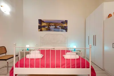 Letto o letti in una camera di Appuntamento a Ponte Vecchio