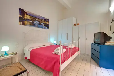 Letto o letti in una camera di Appuntamento a Ponte Vecchio