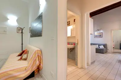 Letto o letti in una camera di Appuntamento a Ponte Vecchio