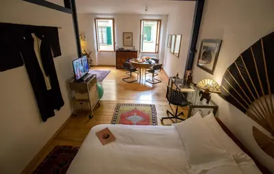 Letto o letti in una camera di Acacia Firenze - Bamboo