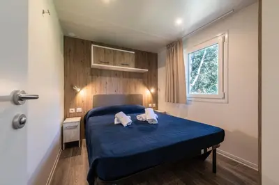 Letto o letti in una camera di Camping Village Panoramico Fiesole