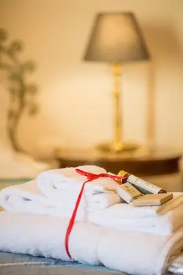 Letto o letti in una camera di B&B PALAZZI