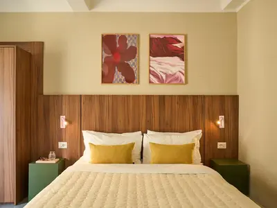 Letto o letti in una camera di Numa Florence Rodo